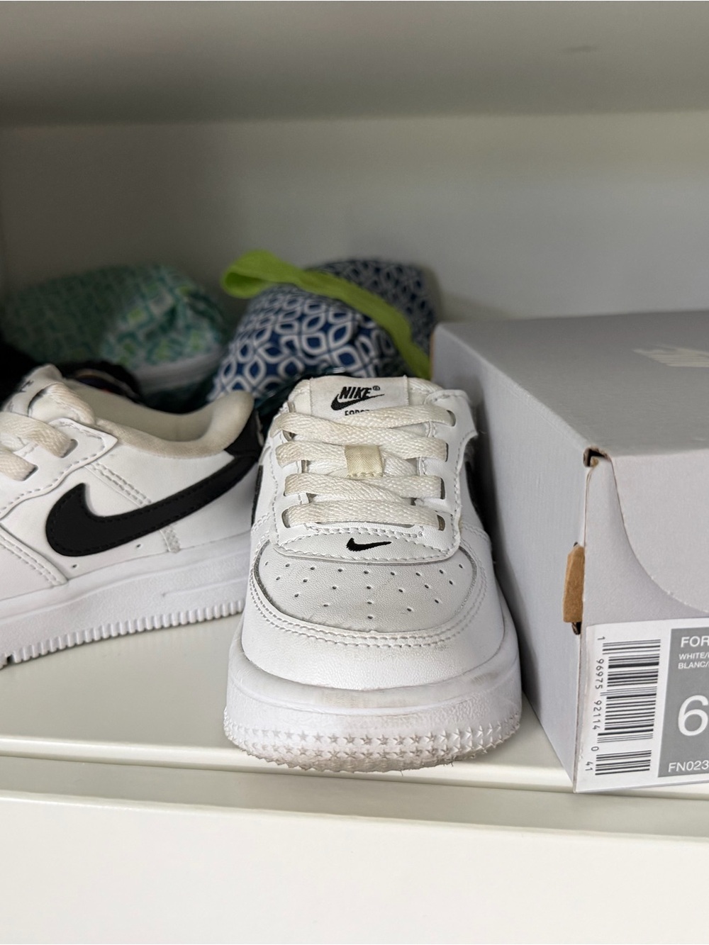 Nike Kids White Sneakers with Black Swoosh